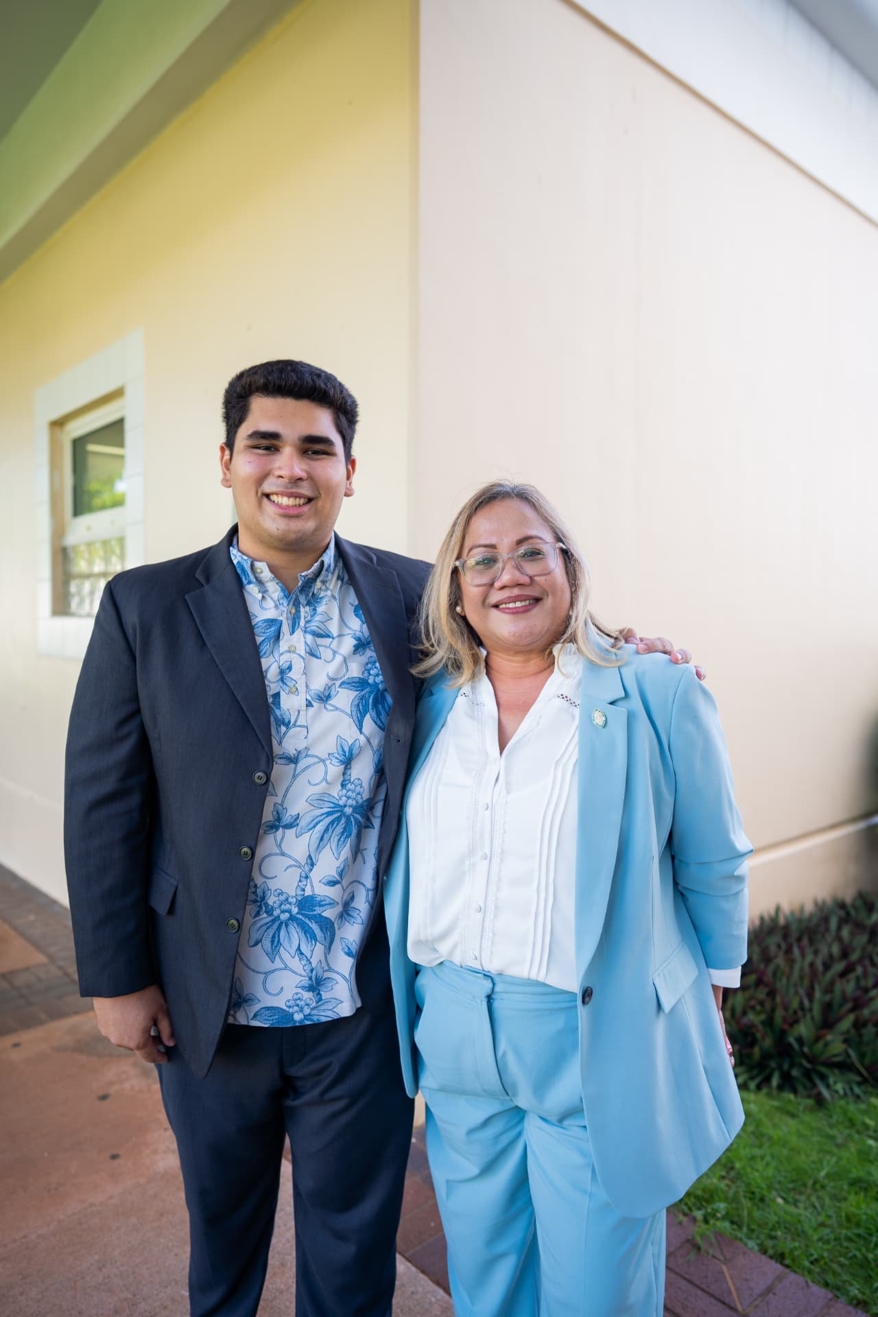 Genesis Babauta with a senator at the forum