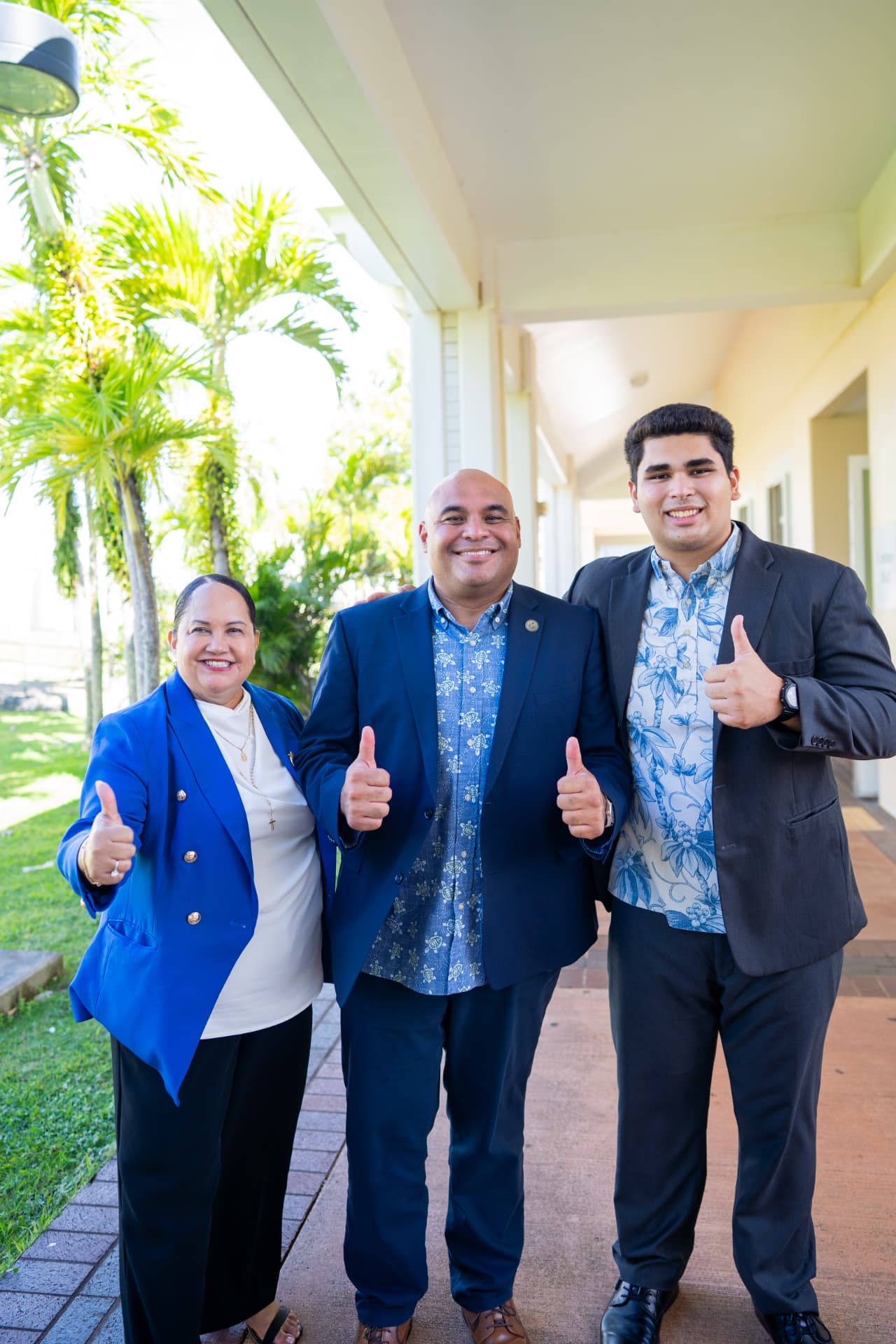 Genesis Babauta with Guam leaders at the forum