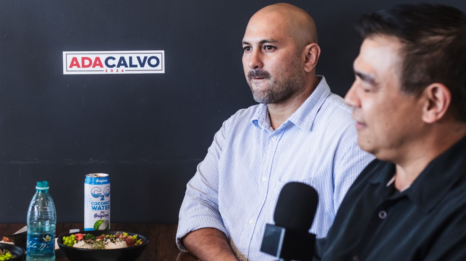 Genesis Babauta with both mics out at the Ada Calvo lunch interview